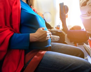 pregnant woman travel by plane