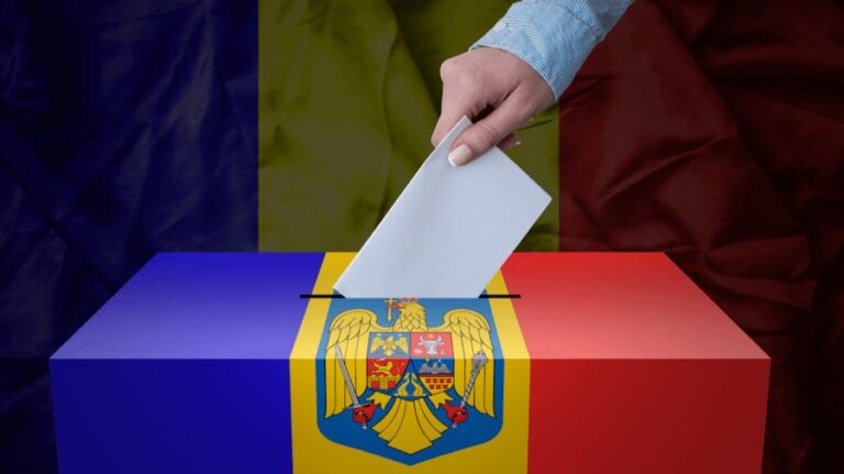 Imagine cu un afiș electoral în fața unei secții de votare din nordul Republicii Moldova