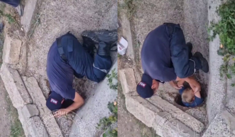Pompieri din Tiraspol scot un copil blocat într-o conductă de drenaj.